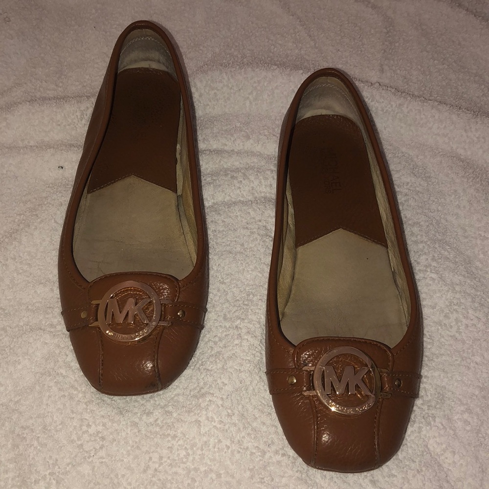 Well worn Michael Kors flats